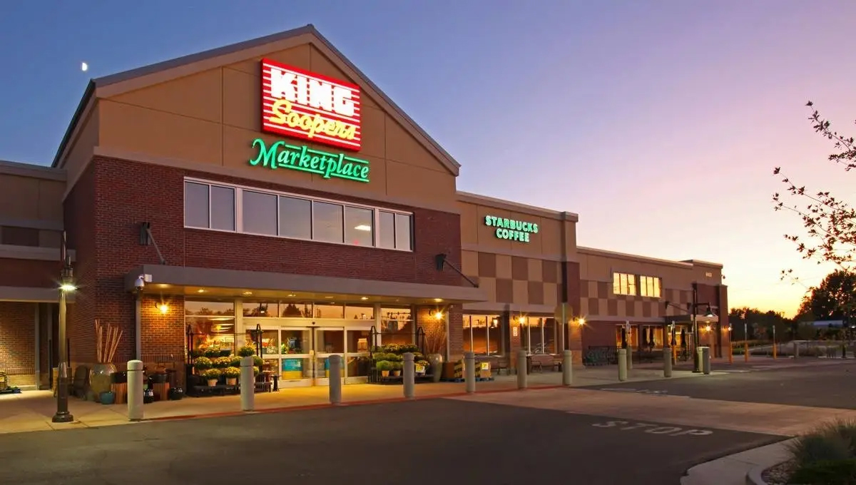 The facade of a shopping center, showing a King Soopers Grocery store
