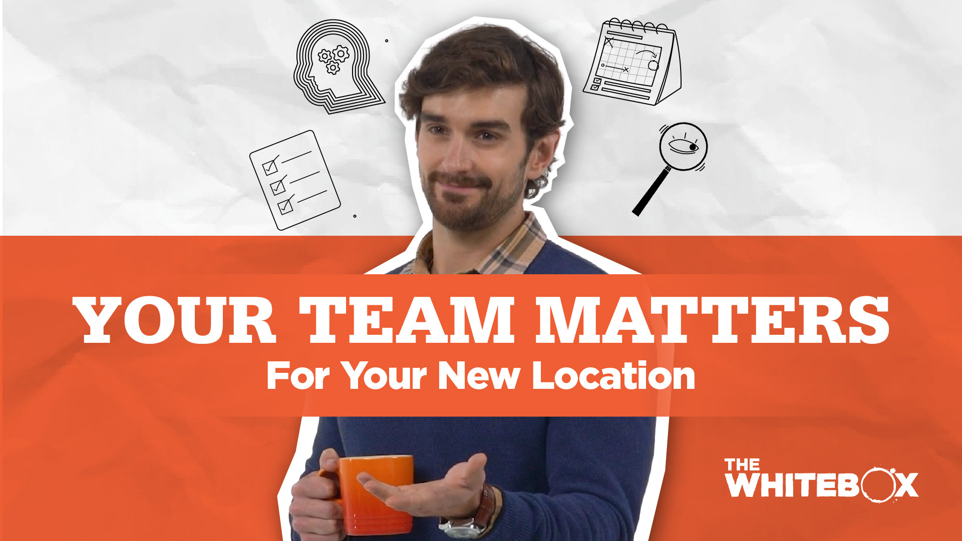 Image of The Whitebox host standing in front of a gray backgound.